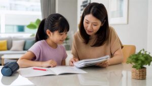 Parent and child deciding how many past-year papers to complete